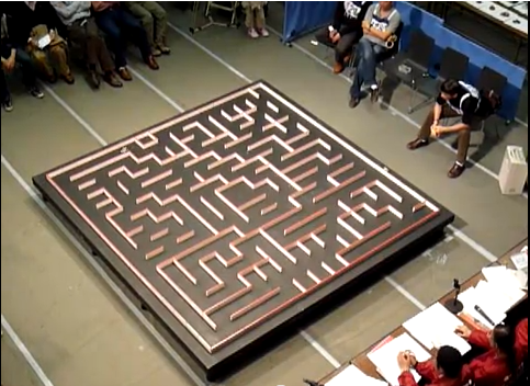 Robot mouse explores maze.